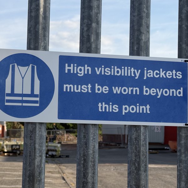 Clearly positioned safety signage on a UK construction site